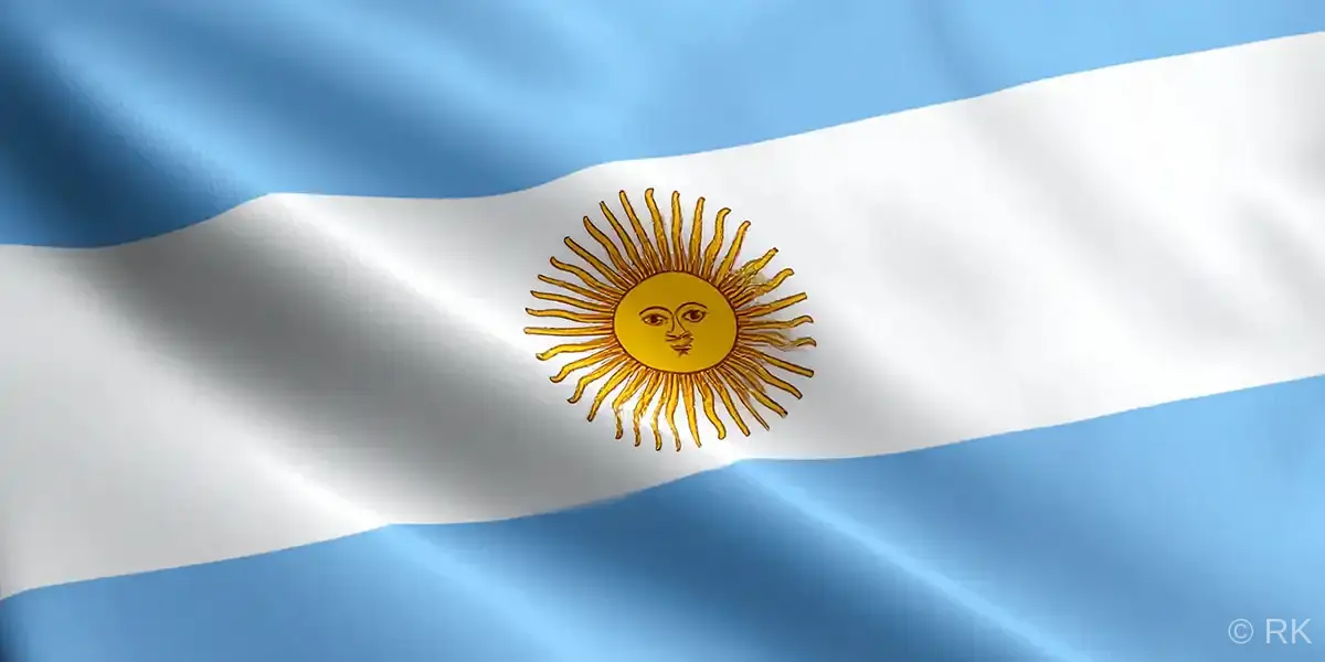 Zastava Argentine sa plavo-belim prugama i zlatnim Suncem Maja u sredini