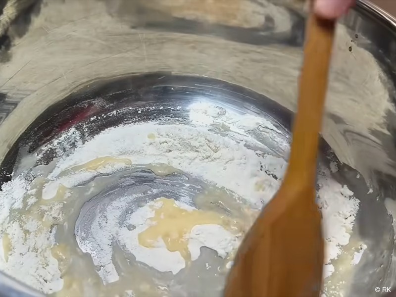 Preparing the mixture for the meatballs